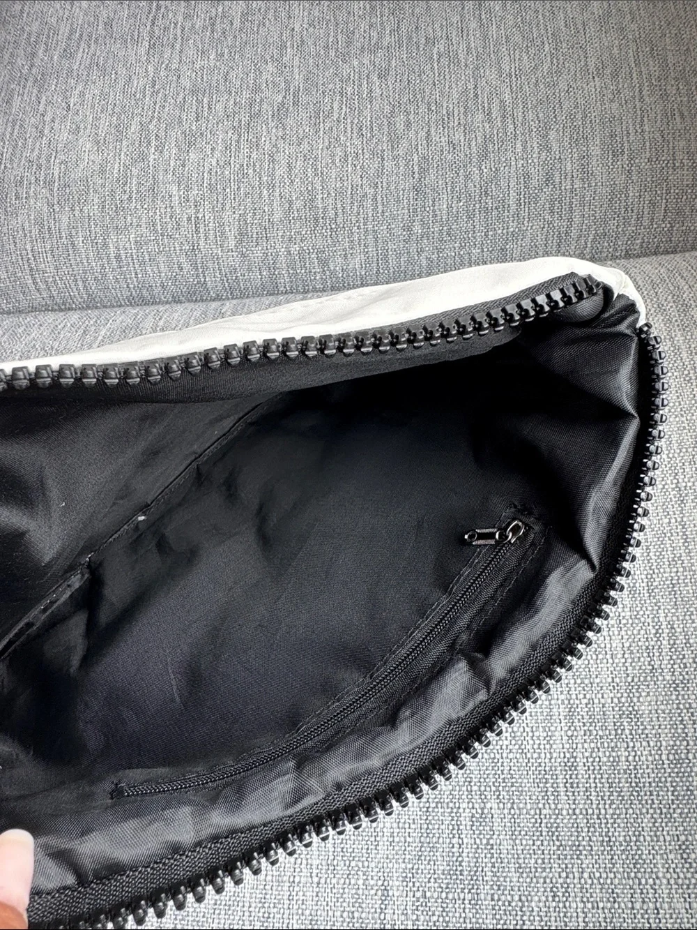 CHANEL Cream Quilted Pouch with Black Logo